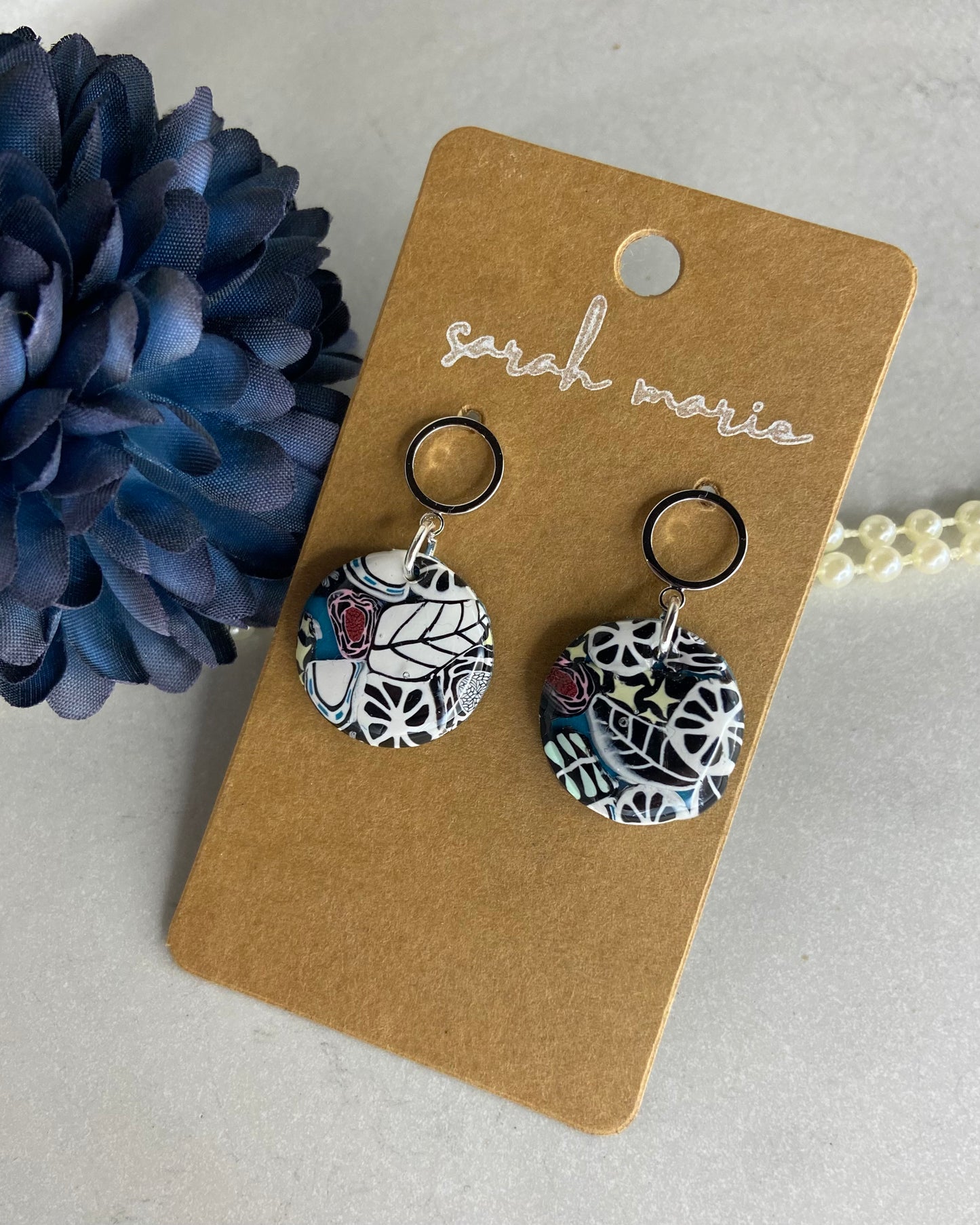 Black and white earrings with circle drop