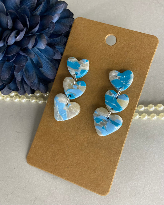 Sweet pea’s blue heart trio dangle earrings