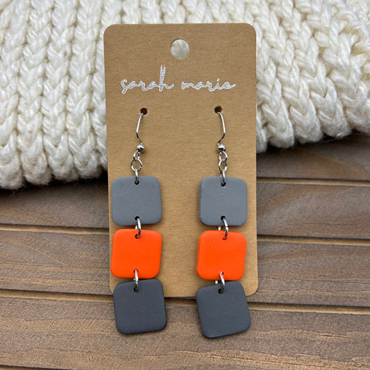 Orange and gray dangles